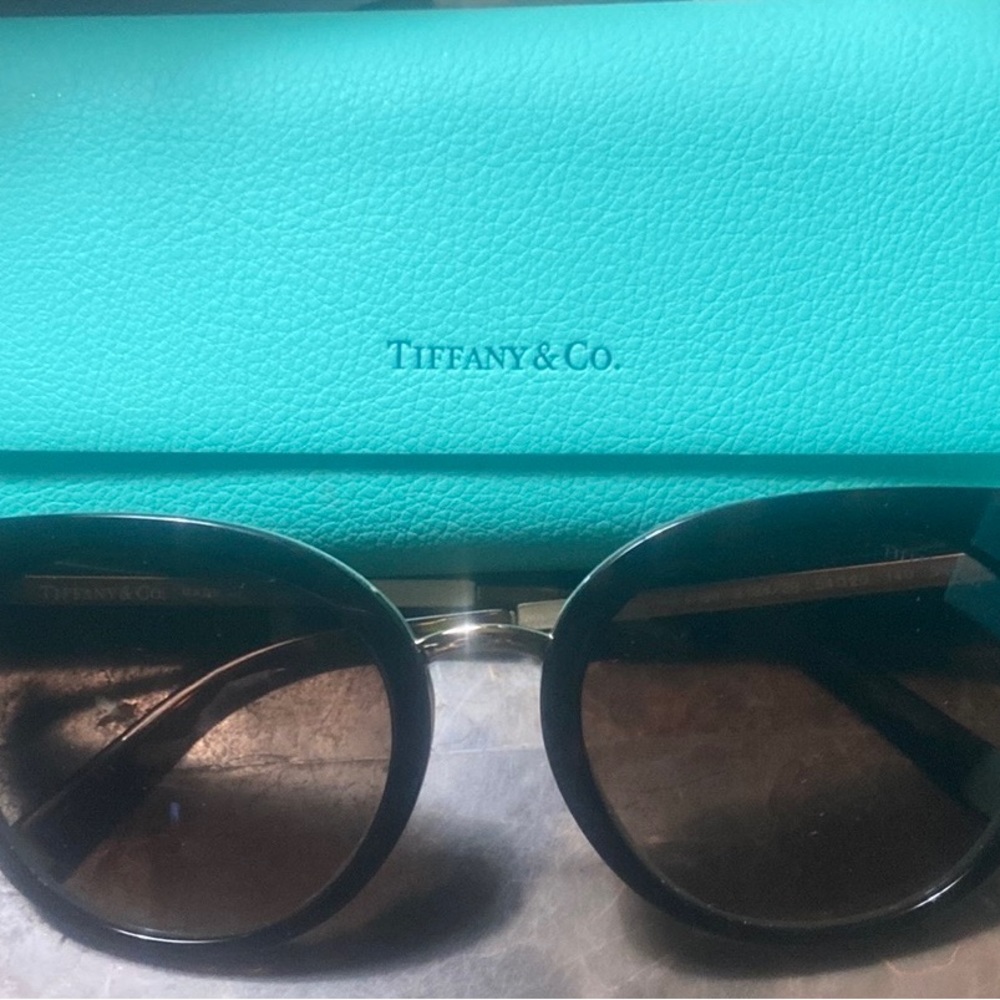 Brand New never worn sitting on a shelf. Tortoise shell brown.